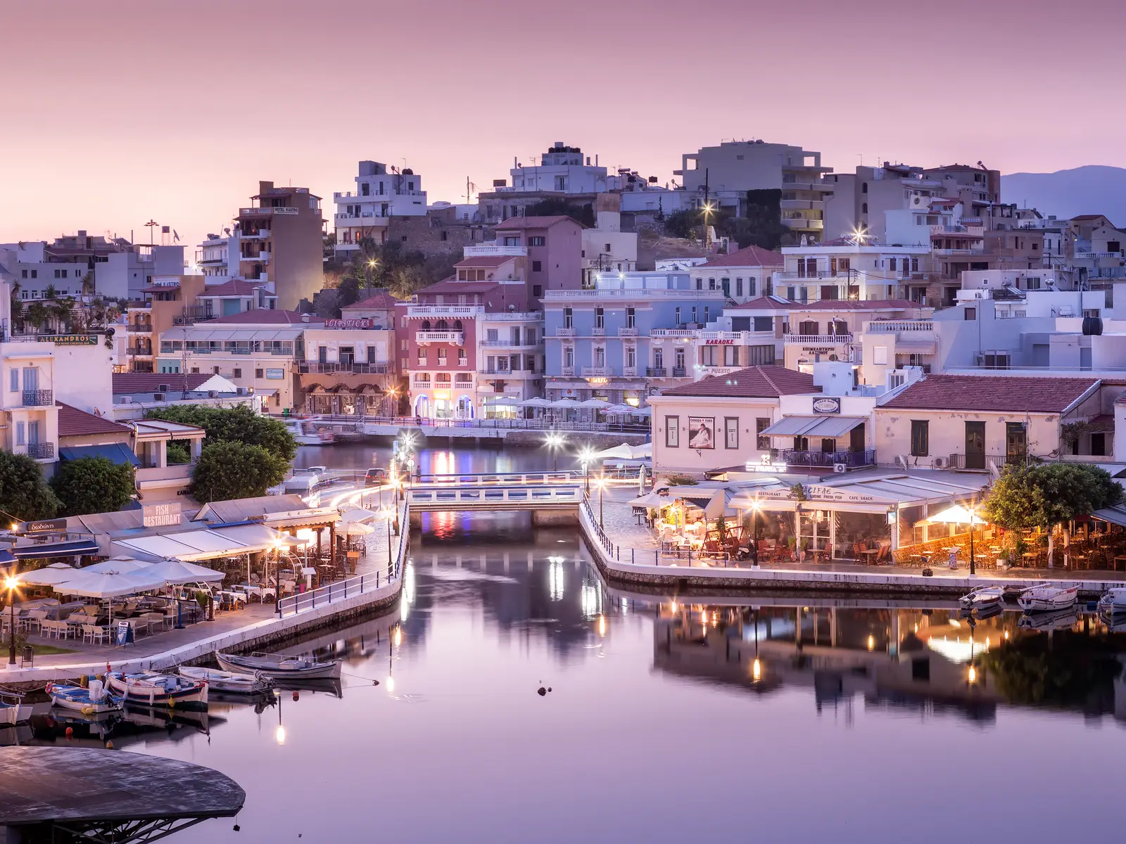 Sunrise light over Lake Voulismeni in Agios Nikolaos