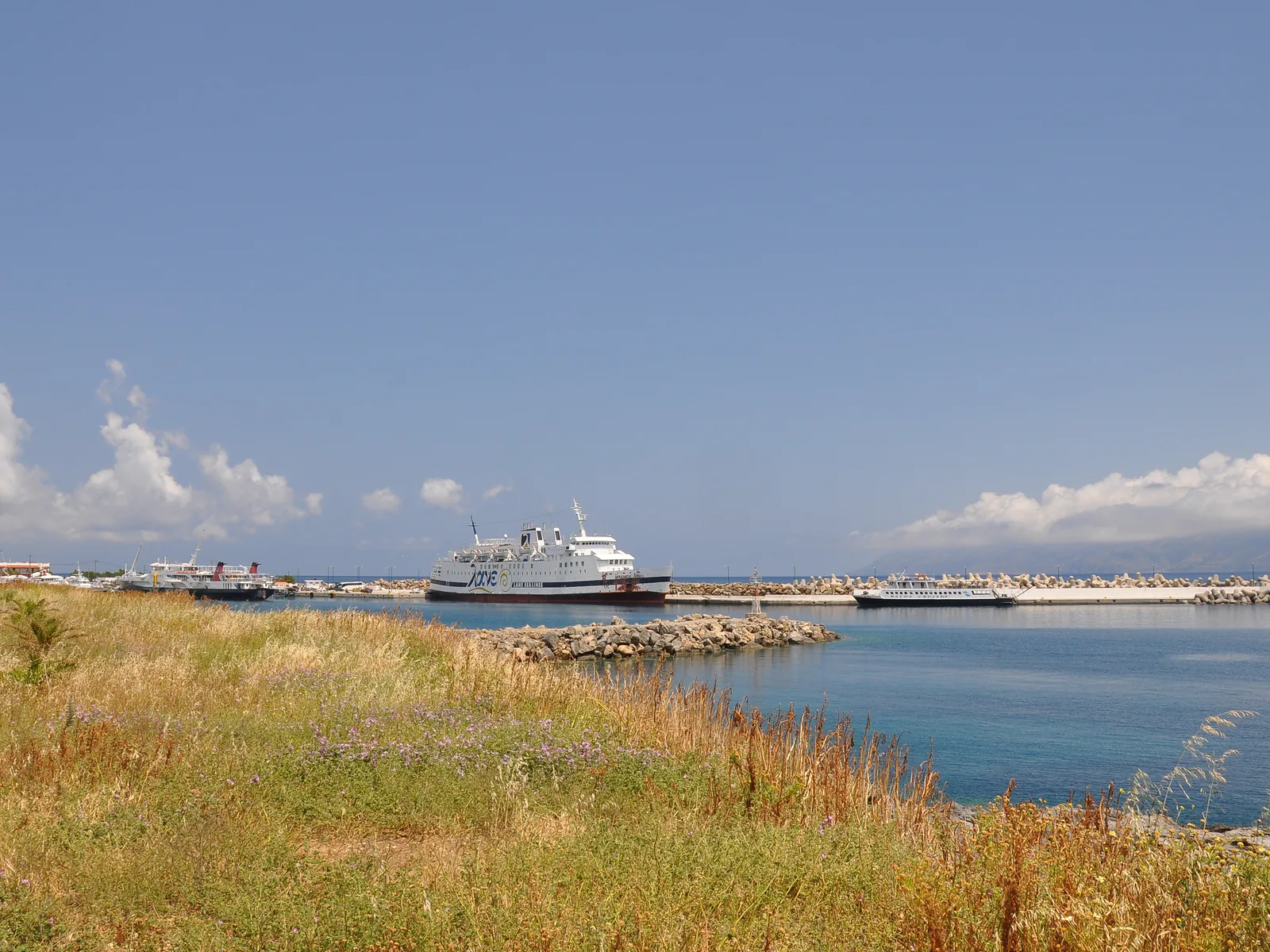 A ferry moored at the quay of Kissamos port